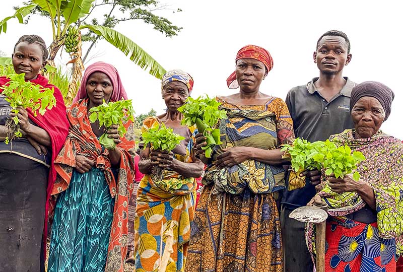 women holding their harvests