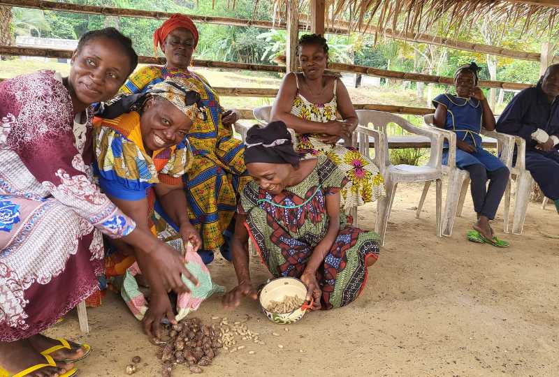 Women sharing crops between themselves