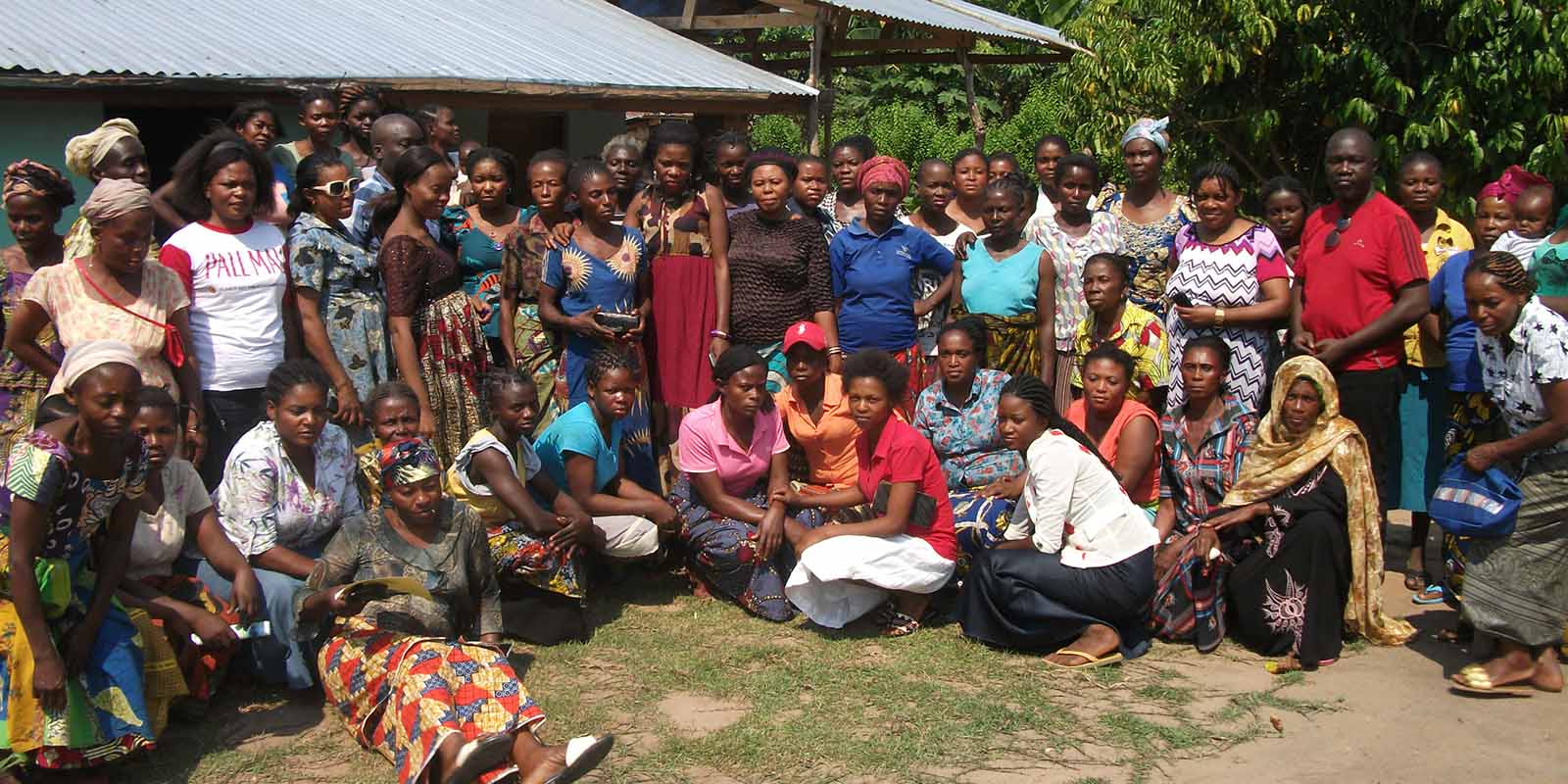 A group of people happily posing together for a photo.