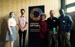 People smile at the Conservation Optimism summit