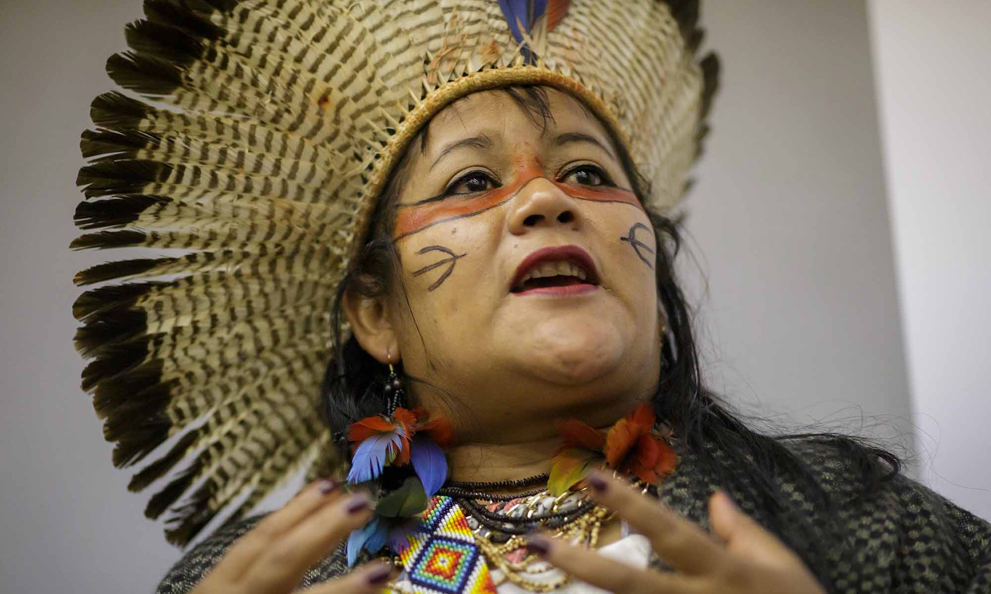 An indigenous woman talking