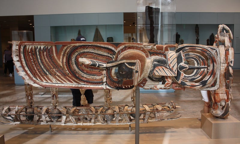 A large (surfboard size) intricate wooden carving