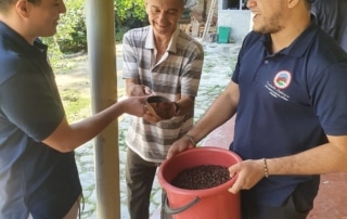 The team hold a bucket