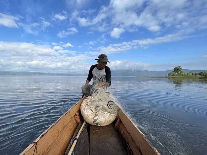 Fisherman on lake