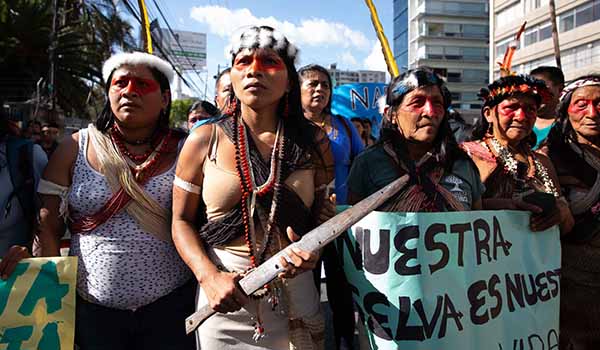 Nemonte Nenquimo at a protest