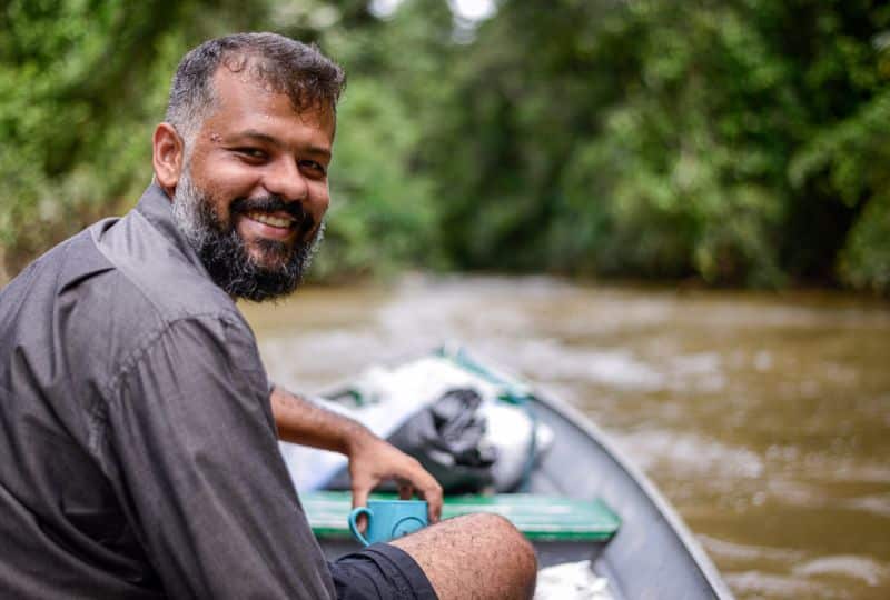 Hugo Costa on a boat in a river