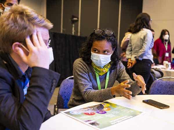 Members of the Global Youth Biodiversity Network in conversation at the UN Biodiversity Conference COP15 in Montreal