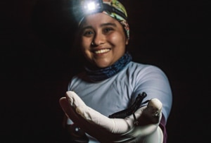 Maria holding a salamander