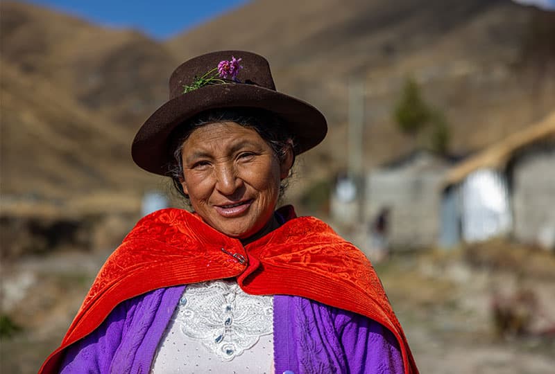 Indigenous woman from the Ayacucho region of Per in colourful dress.