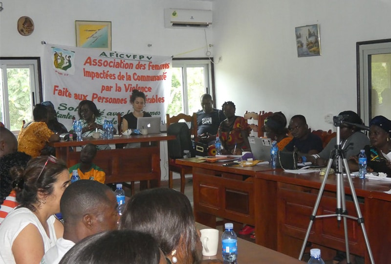 members at a meeting of Alliance members, including women groups.
