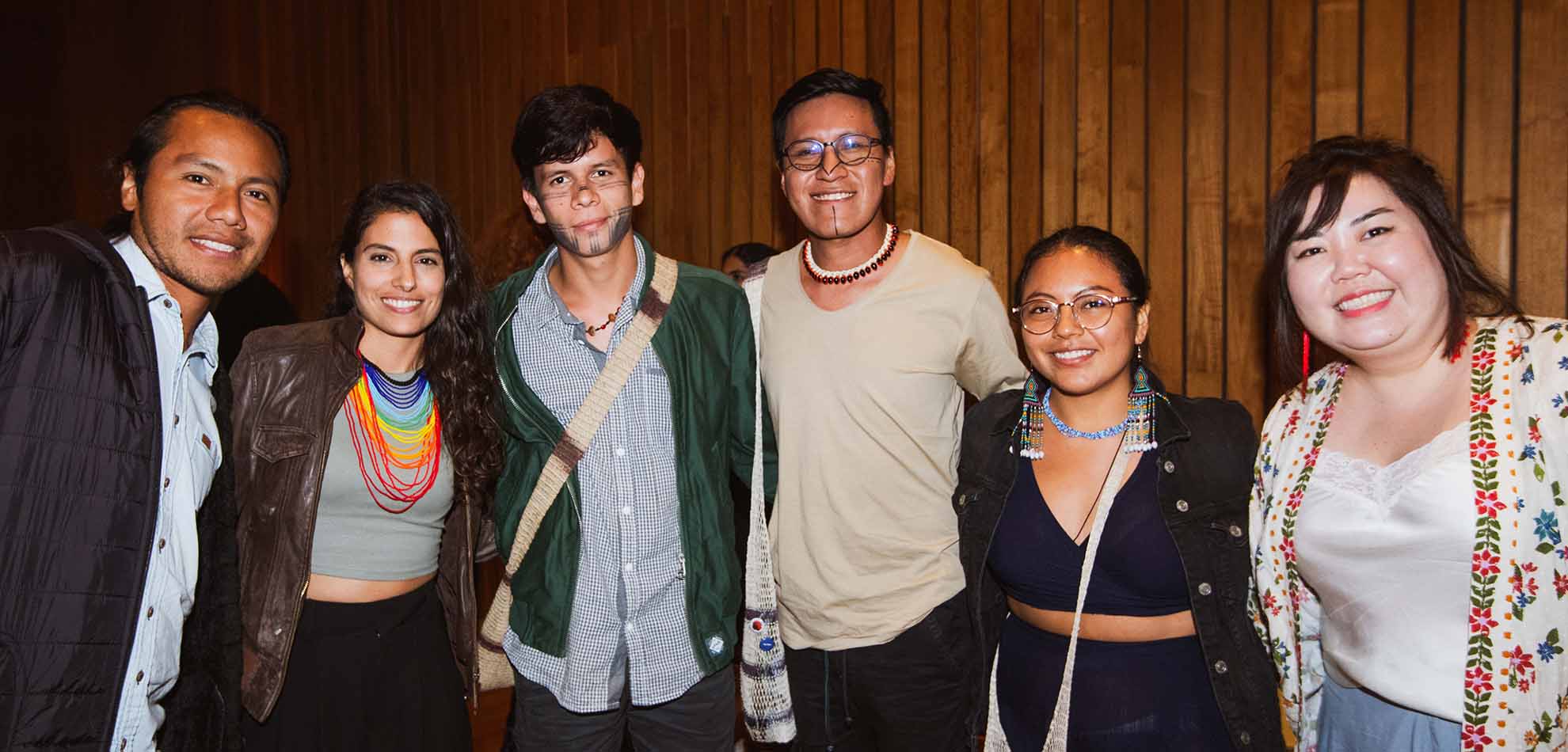 6 young people smile at the camera at a launch event in New York for the Chrysalis Youth Fund