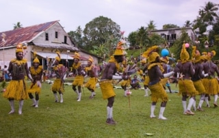 Indigenous Peoples taking part in traditional activities.