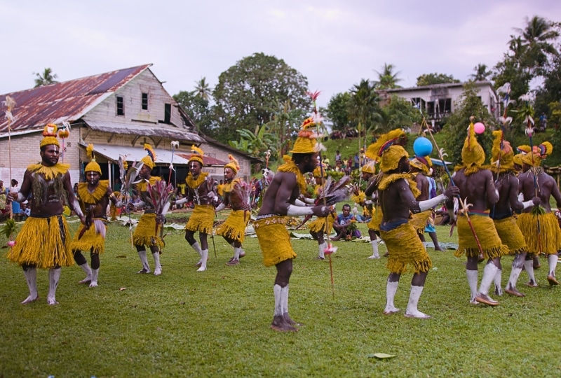 Indigenous Peoples taking part in traditional activities.