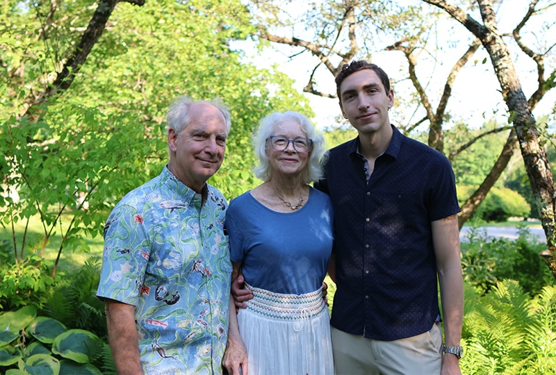 Kristina Gjerde with her husband and son, smiling and posing for a photo at the Ocean Stewardship Award event