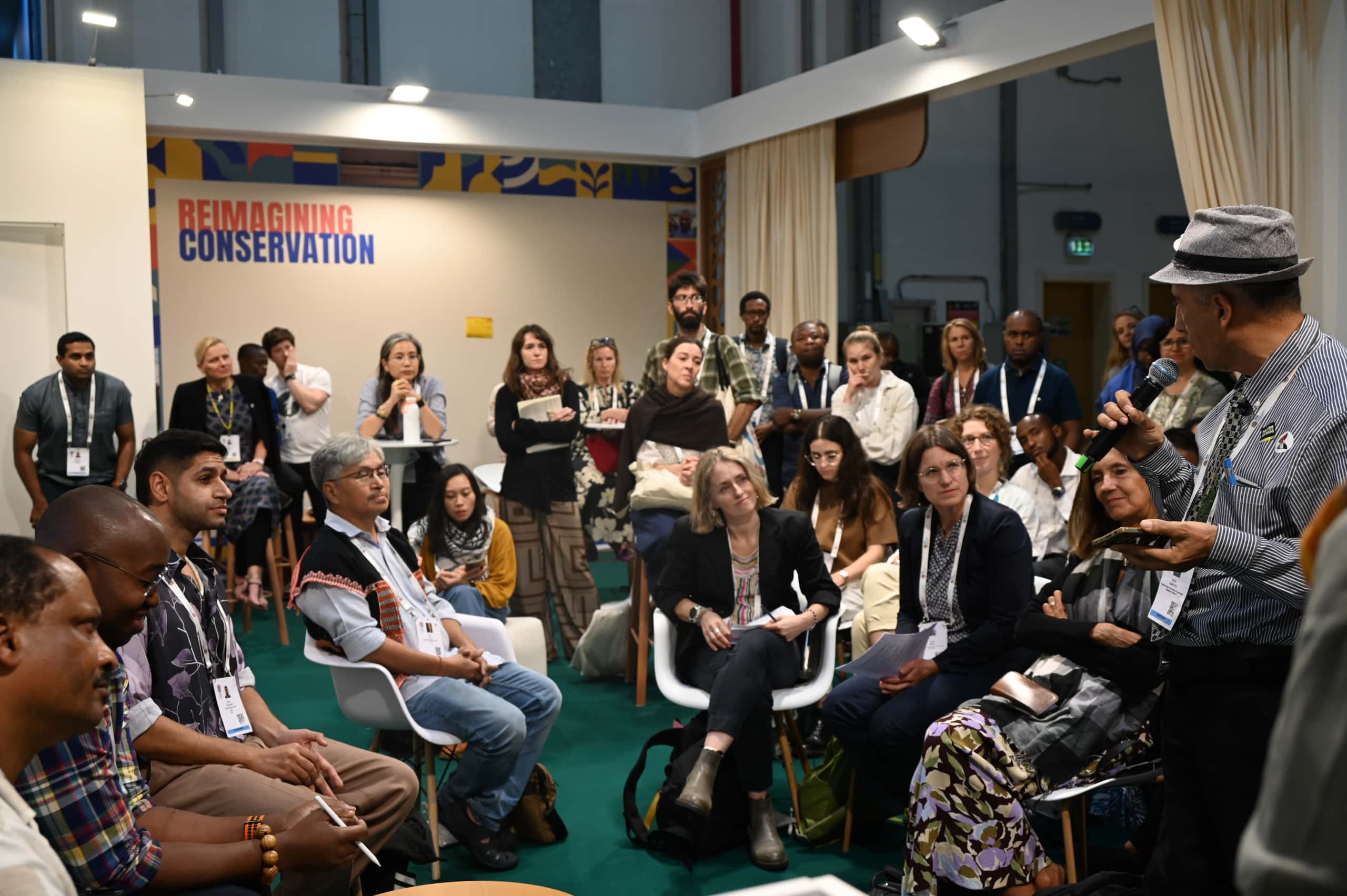 A listening crowd in the pavilion